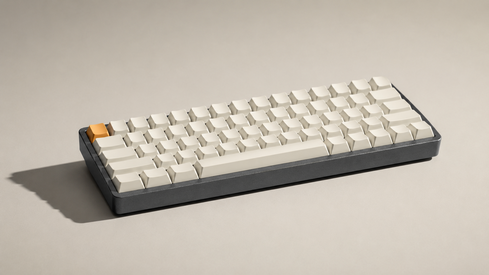An editorial studio scene featuring a compact mechanical keyboard